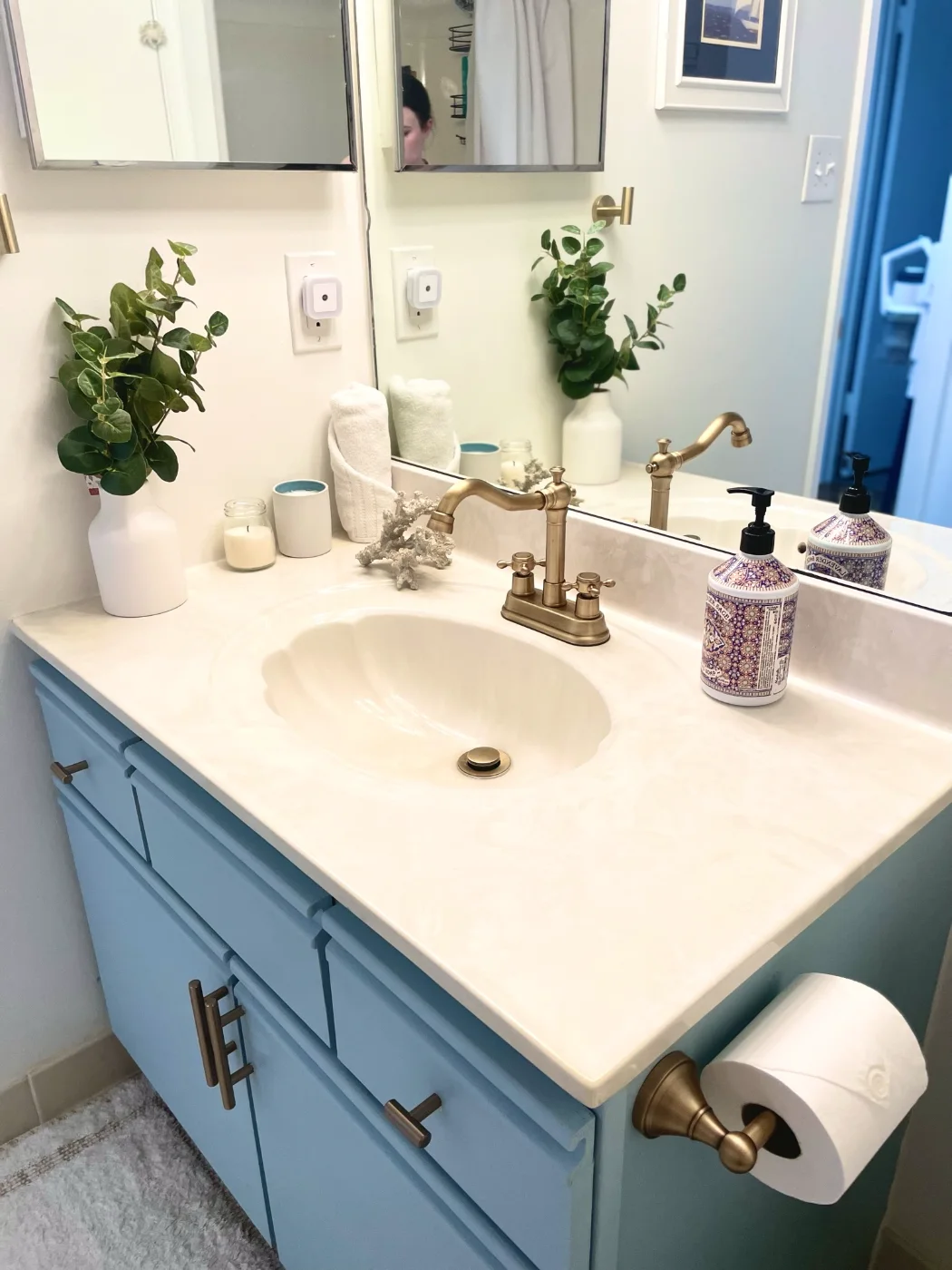 Bathroom vanity wiped, polished and guest-ready